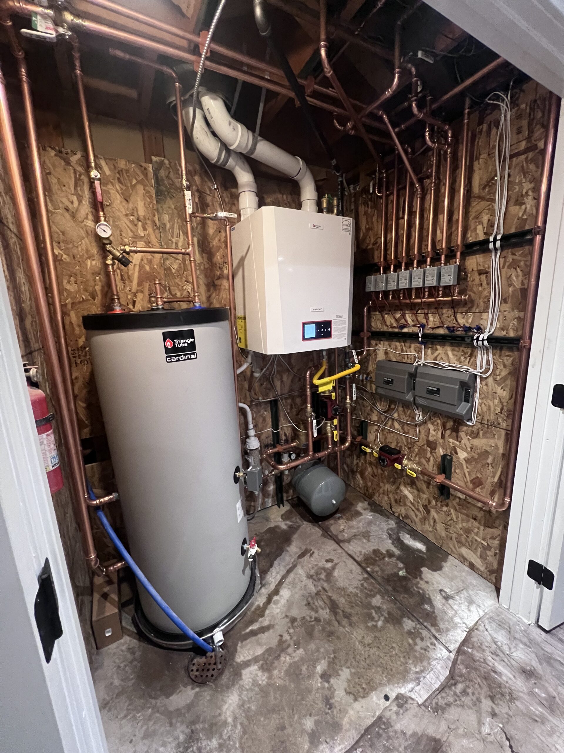 A man working on a heating unit in Castle Rock, CO